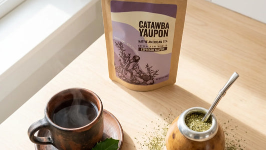 A pouch of Catawba Yaupon espresso tea next to a clay cup and mate gourd, showcasing this native North American alternative to traditional yerba mate.