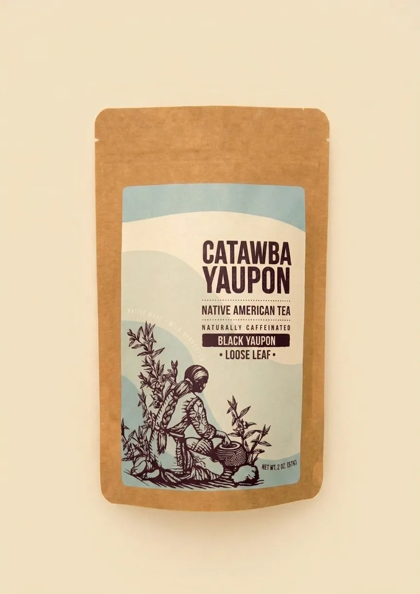 Catawba Yaupon Black Yaupon loose leaf tea in a brown kraft stand-up pouch with a light blue label.