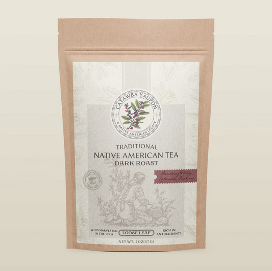 A stand-up pouch of Catawba Yaupon Traditional Native American Tea, specifically the dark roast loose leaf variety, on a cream background.