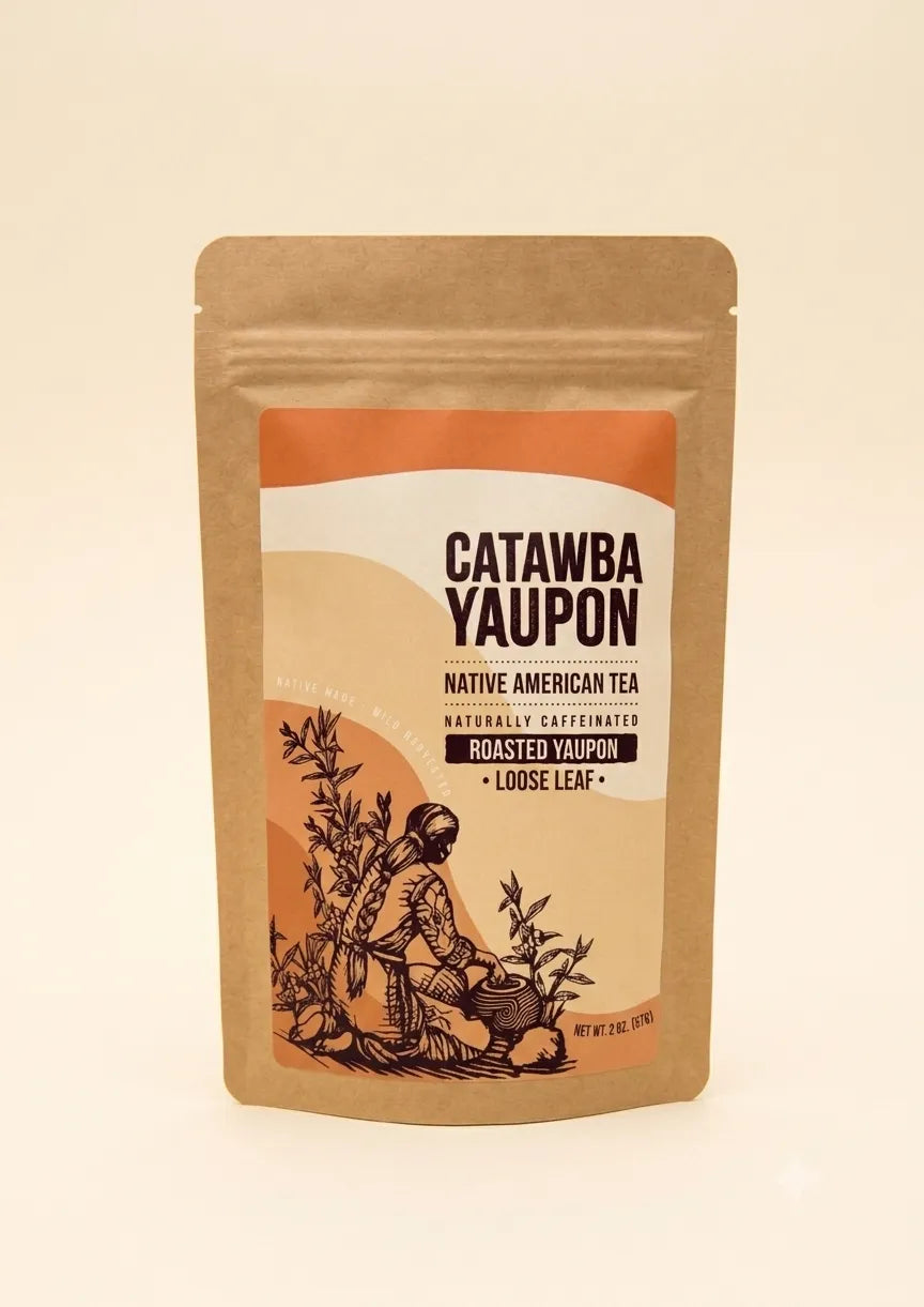 A centered view of a craft paper pouch of Catawba Yaupon dark roasted loose leaf tea standing against a plain cream background.