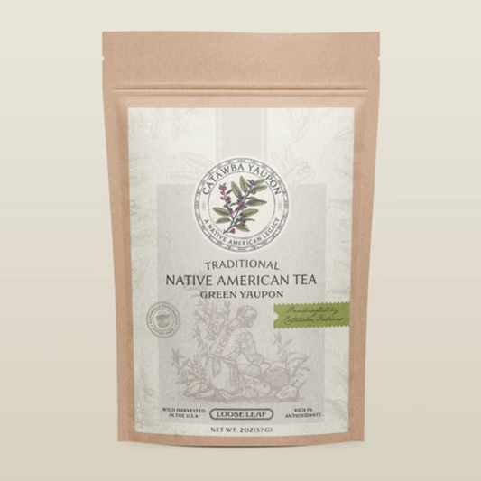 Front view of a Catawba Yaupon Green Yaupon loose leaf tea pouch with a light green label and traditional Native American illustration.
